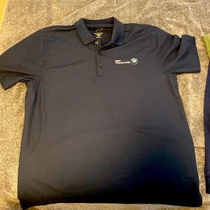 Navy blue BMW Greg Norman polo shirt. Never been worn